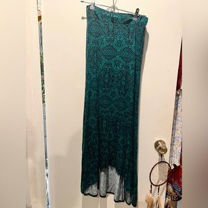 Long asymmetrical skirt, black with teal design